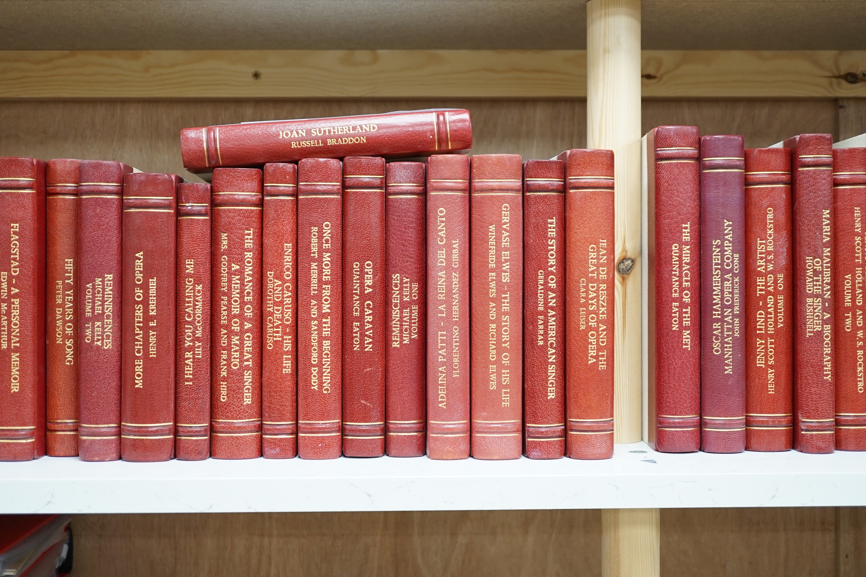 A collection of 19th and 20th century works on opera related biographies, autobiographies and histories, bound in red morocco by EA Weeks, London, one signed by the author, approx. 69 in total. Please note :- A SIMILAR L